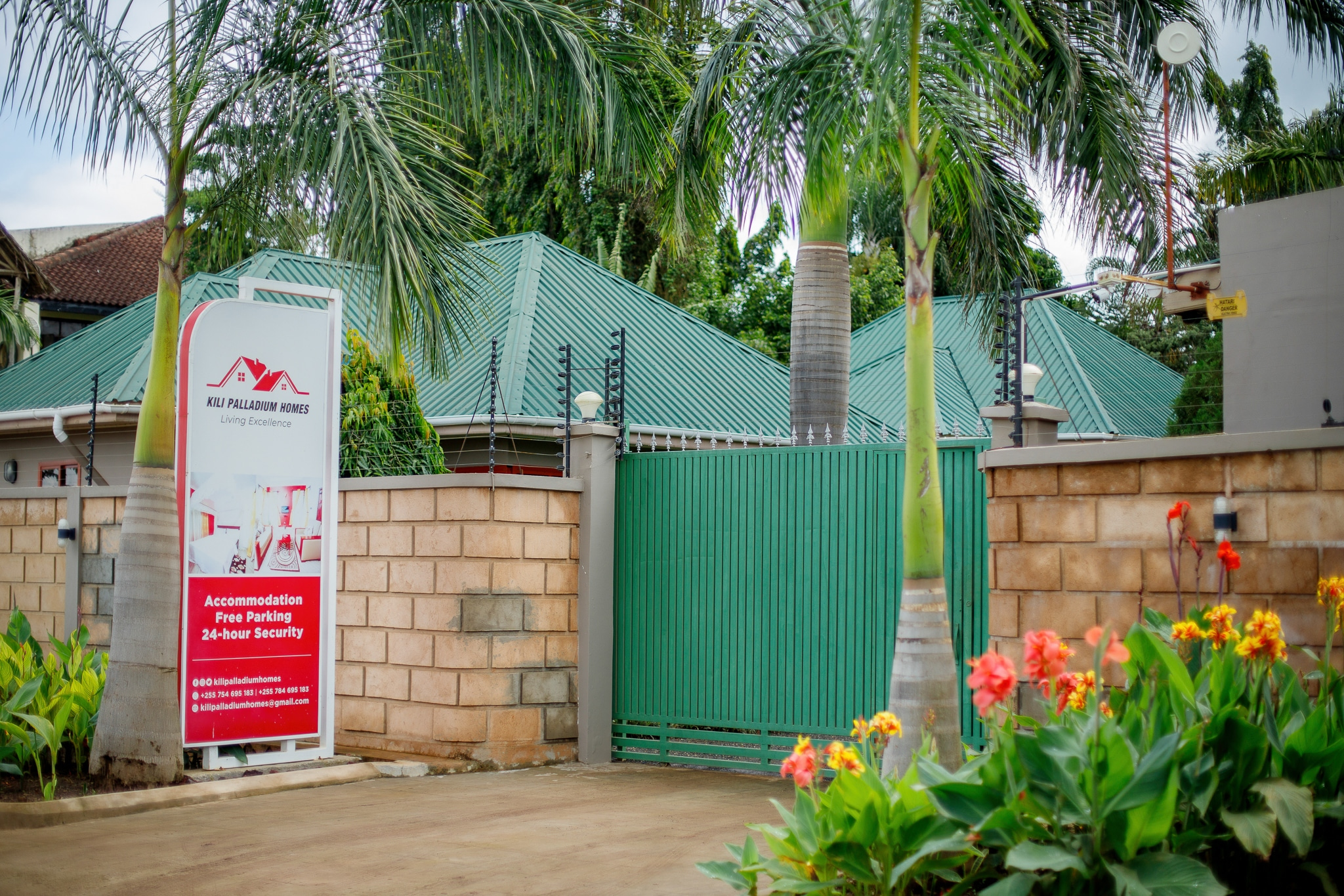 Professional entrance gate with Kili Palladium signage